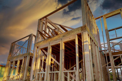 Low angle view of abandoned construction against sky