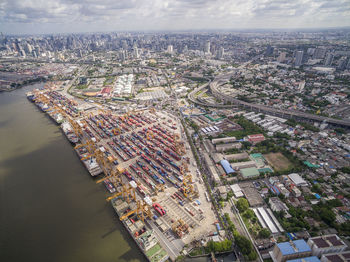 High angle view of river amidst buildings in city