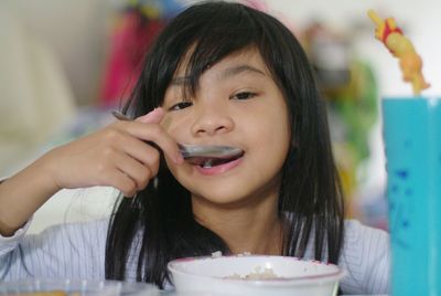 Portrait of boy holding ice cream