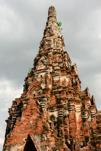 Low angle view of old building in ayutthaya province under the blue sky