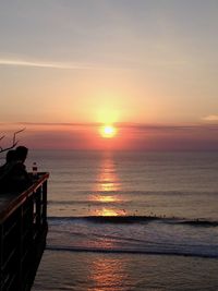 Scenic view of sea at sunset