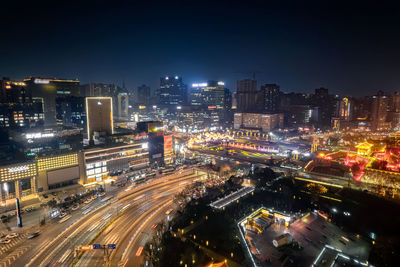 High angle view of illuminated city at night