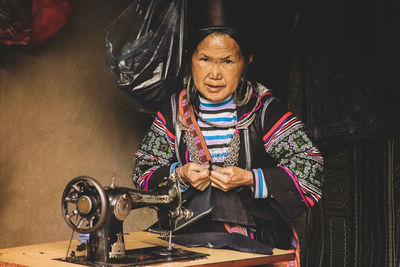 Portrait of woman working at home