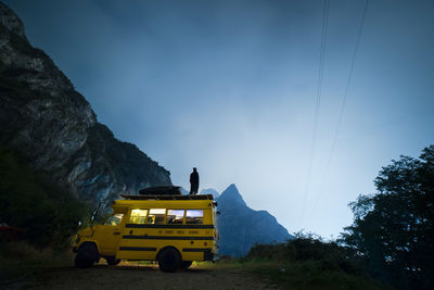 Low angle view of yellow road against sky
