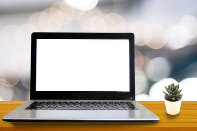 Close-up of laptop on table