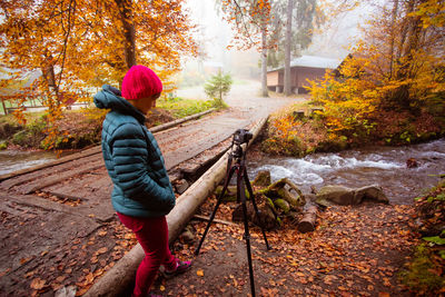 Full length of man in forest during autumn