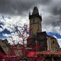 Low angle view of church against cloudy sky