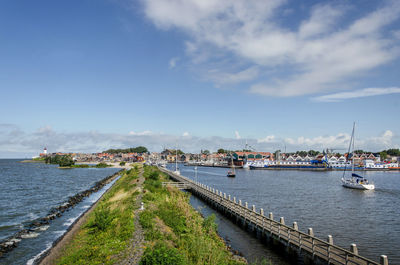 View from the little wooden observation tower along the harbour pier to the old village