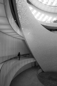 High angle view of person on staircase in building