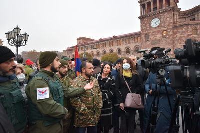 Group of people in front of building