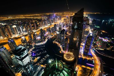 High angle view of illuminated buildings at night