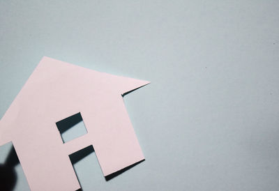 High angle view of sign on white table