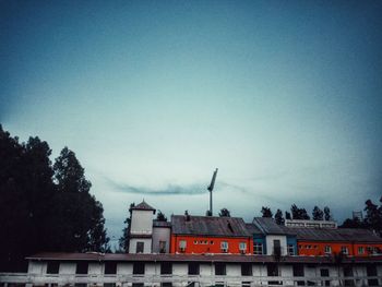 Low angle view of building against blue sky