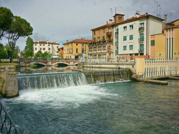 View of canal in city