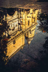 High angle view of illuminated buildings in city