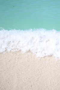 Close-up of waves on beach