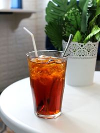 Close-up of tea in glass on table