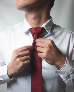 Midsection of businessman working in office