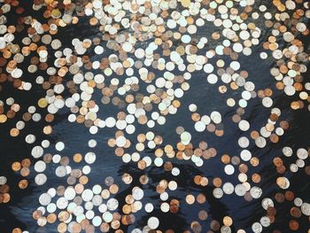 Full frame shot of coins on table