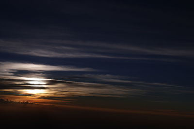 Low angle view of cloudy sky at sunset