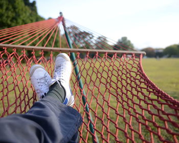 Man relaxing in hammock