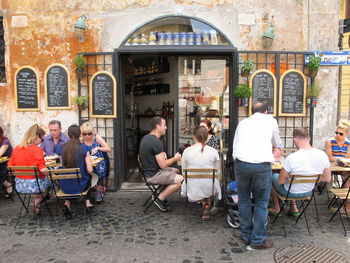 Group of people in front of building