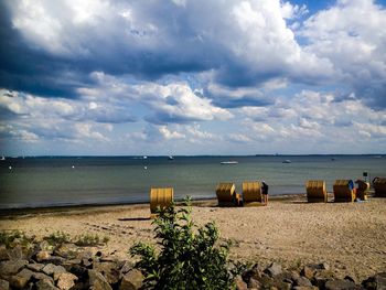 Scenic view of sea against cloudy sky