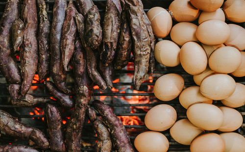 Close-up of meat on barbecue grill