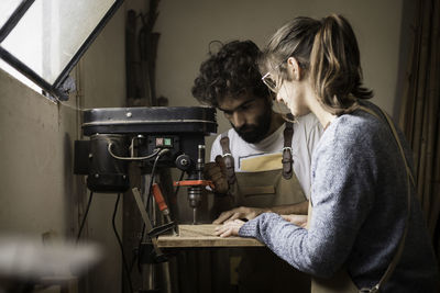 Young couple working