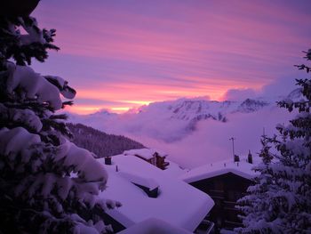 Scenic view of mountains against sky during sunset