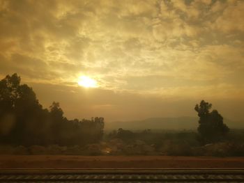 Scenic view of landscape against sky during sunset