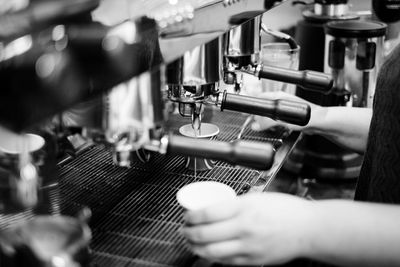 Close-up of man preparing cafe