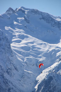 Alpine landscape in winter at alpe d'huez with the mountains covered in snow