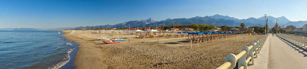 Panoramic view of beach against clear sky