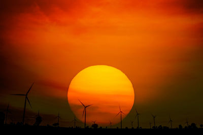 Scenic view of silhouette landscape against romantic sky at sunset