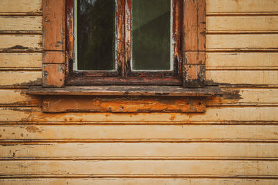 Window of old abandoned building