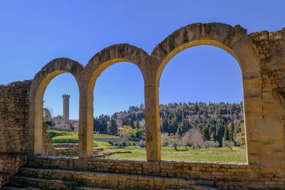 Old ruins against clear blue sky