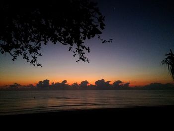 Scenic view of silhouette landscape against sky during sunset