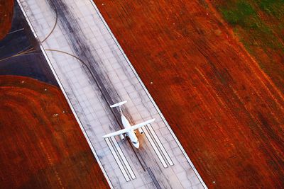 Aerial view of airplane on runway