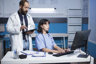 Businesswoman working at desk in office