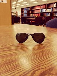 Close-up of sunglasses on table