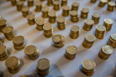 High angle view of coins on table