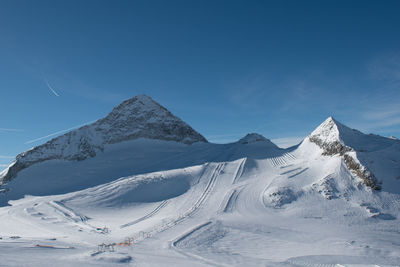 Hintertux glacier panorama on a sunny winter day. snowy background panorama, white winter scenery.