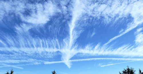 Low angle view of vapor trail in sky