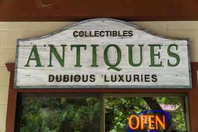 Close-up of information sign on window