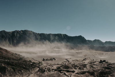 Scenic view of land against clear sky