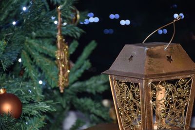 Close-up of illuminated christmas tree at night