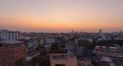 High angle view of townscape against sky during sunset