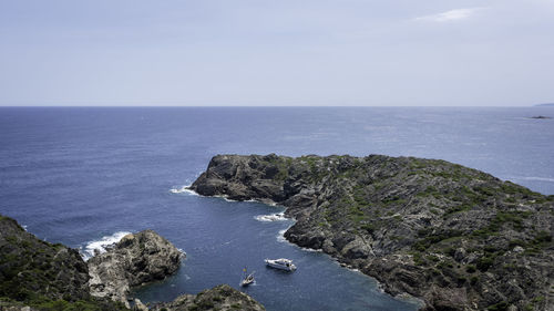 Scenic view of cap de creus against sky