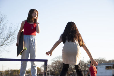 Portrait of teenage girls in skatepark